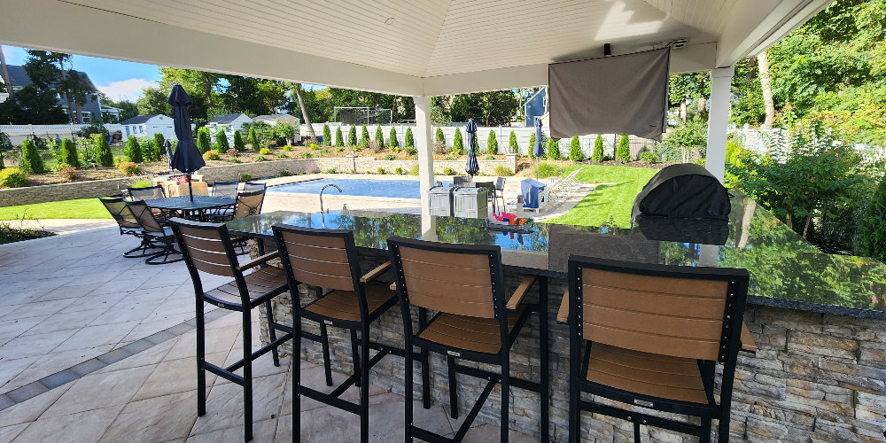 outdoor bar island overlooking pool